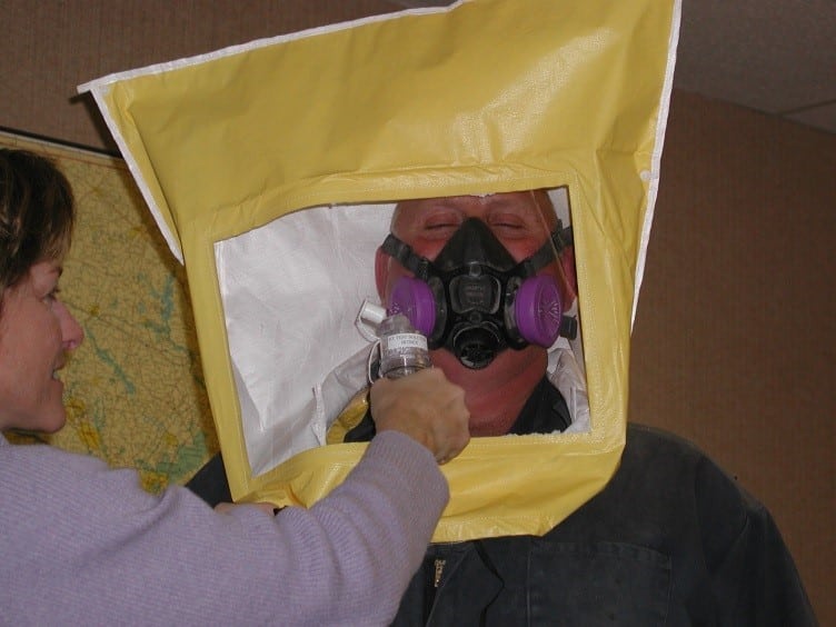 Employee using a respirator for protection